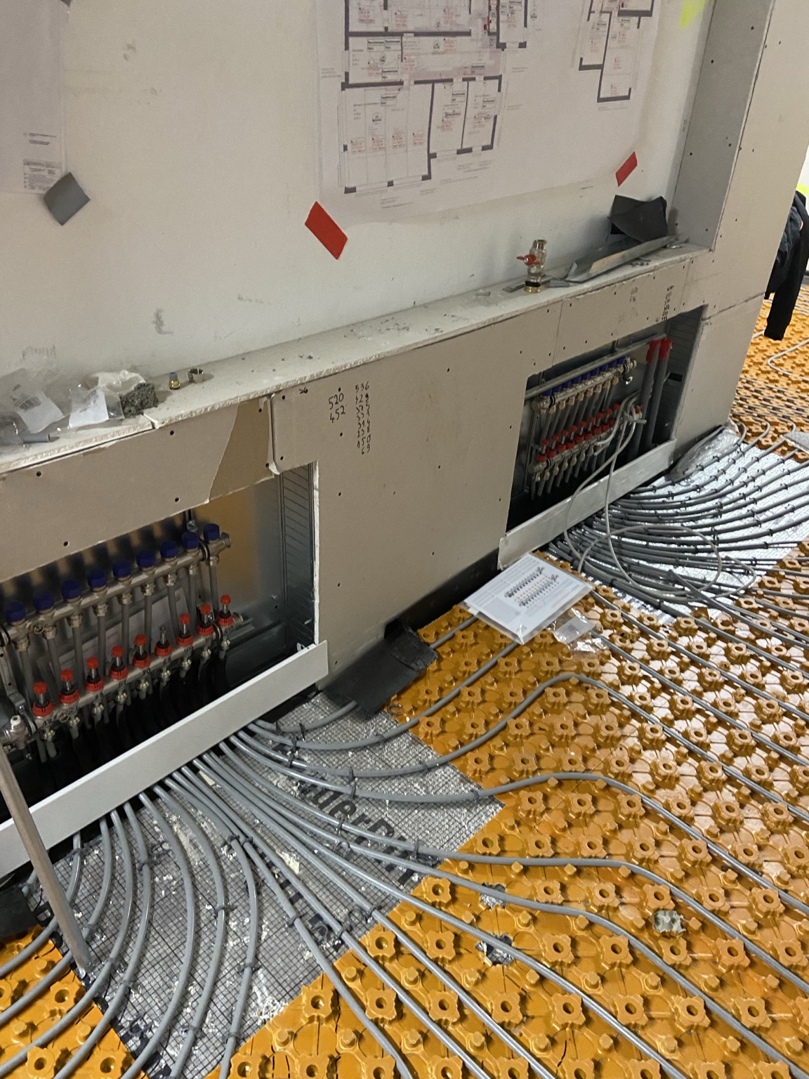 Underfloor heating manifolds and pipe loops installed by HydroPro