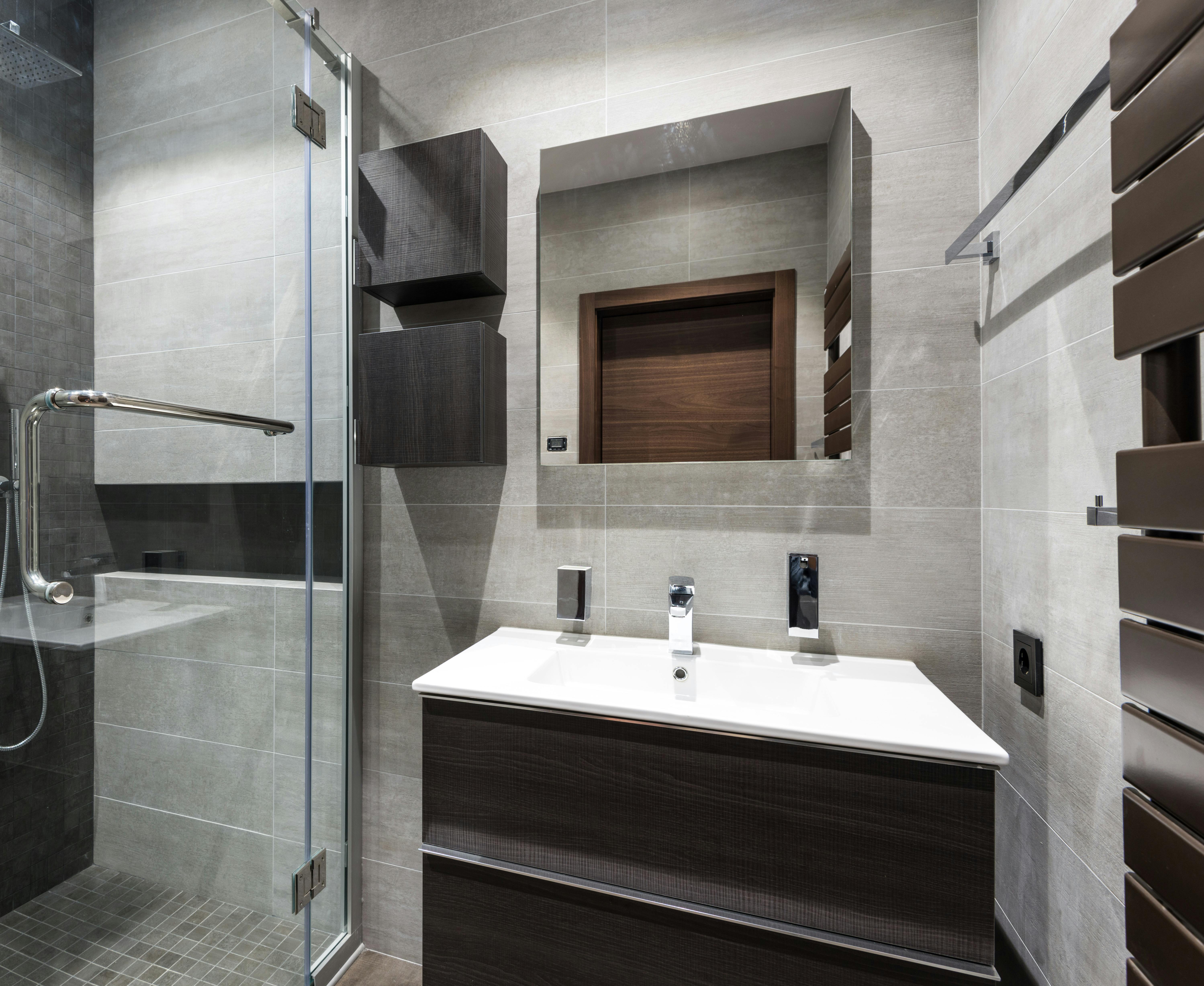 Modern bathroom renovation with shower enclosure and vanity
